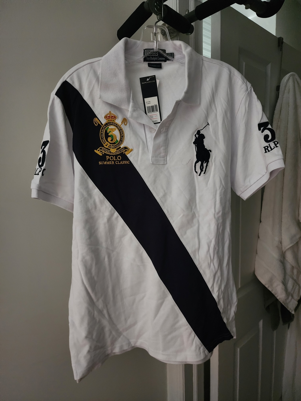 Ralph Lauren White Polo with Navy Diagonal Stripe and Embroidered Crest. S-M